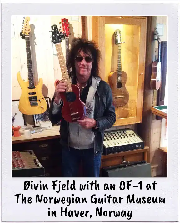 Øivin Fjeld, inventor of the G-Sharp OF-1, with one of the OF-1's at the Norwegian Guitar Museum in Haver, Norway